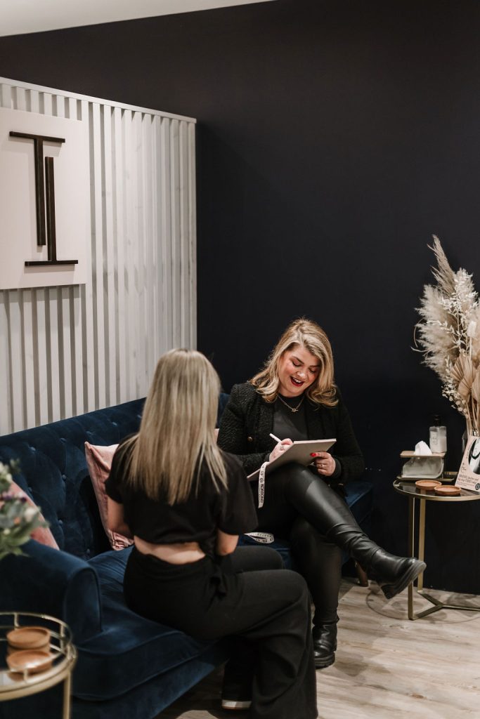 Sian from Tilly's with a customer