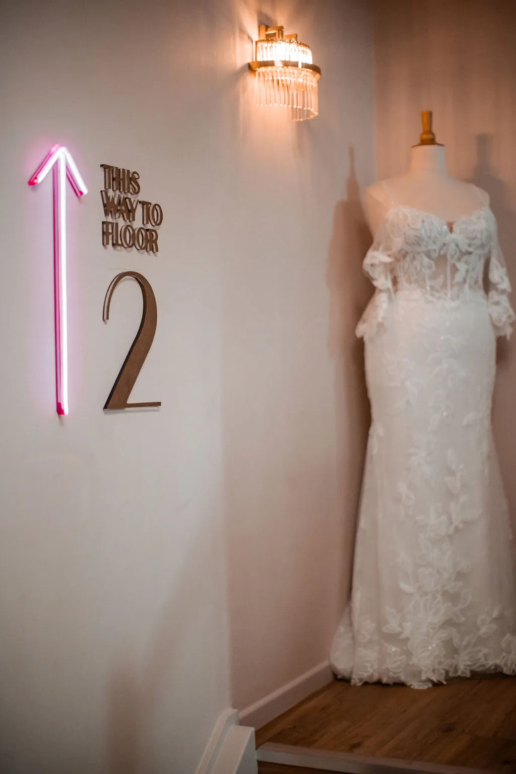 Sign that says this way to floor 2