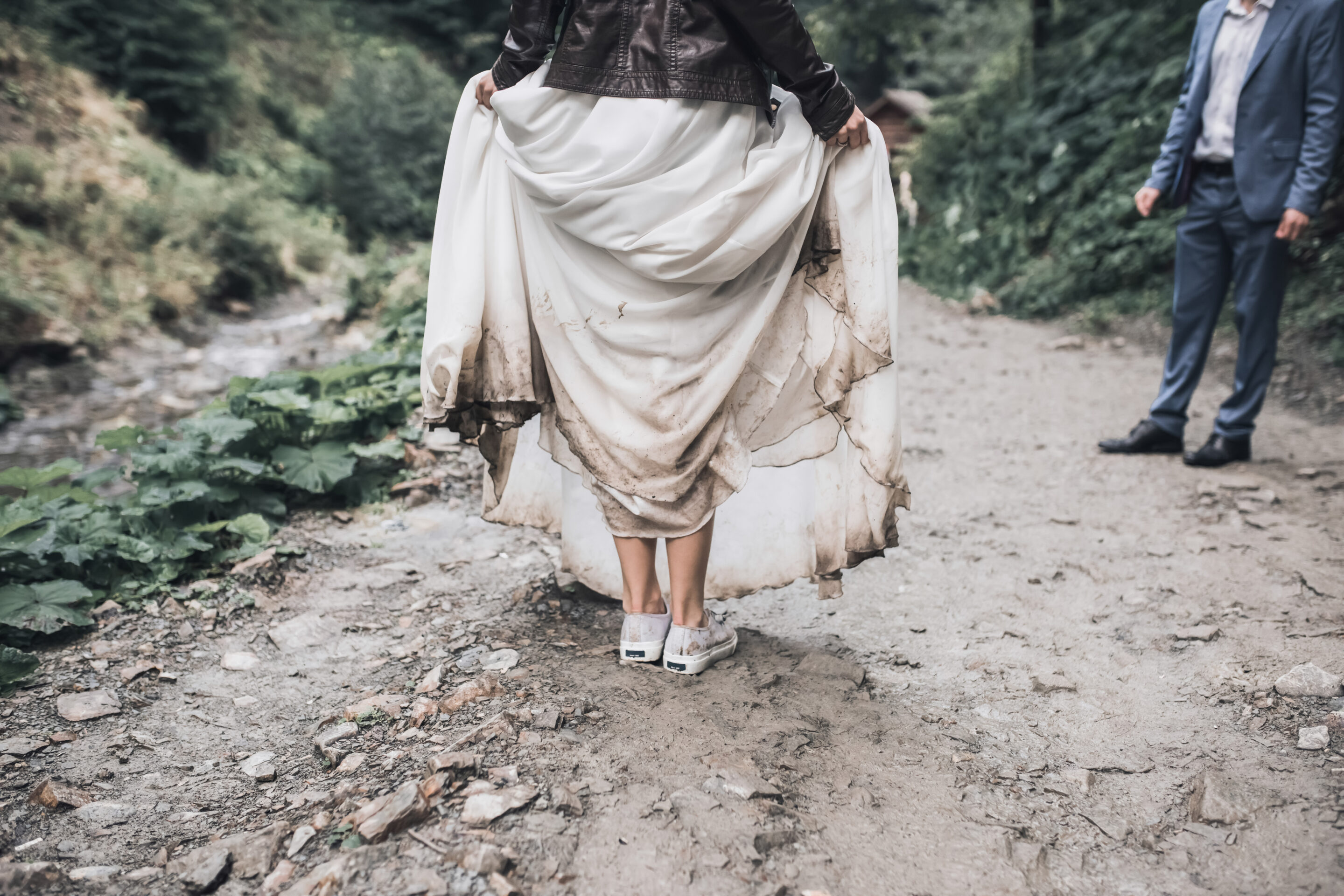 Bride getting their wedding dress dirty